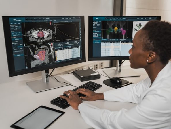 Doctor working at computer for medical SEO